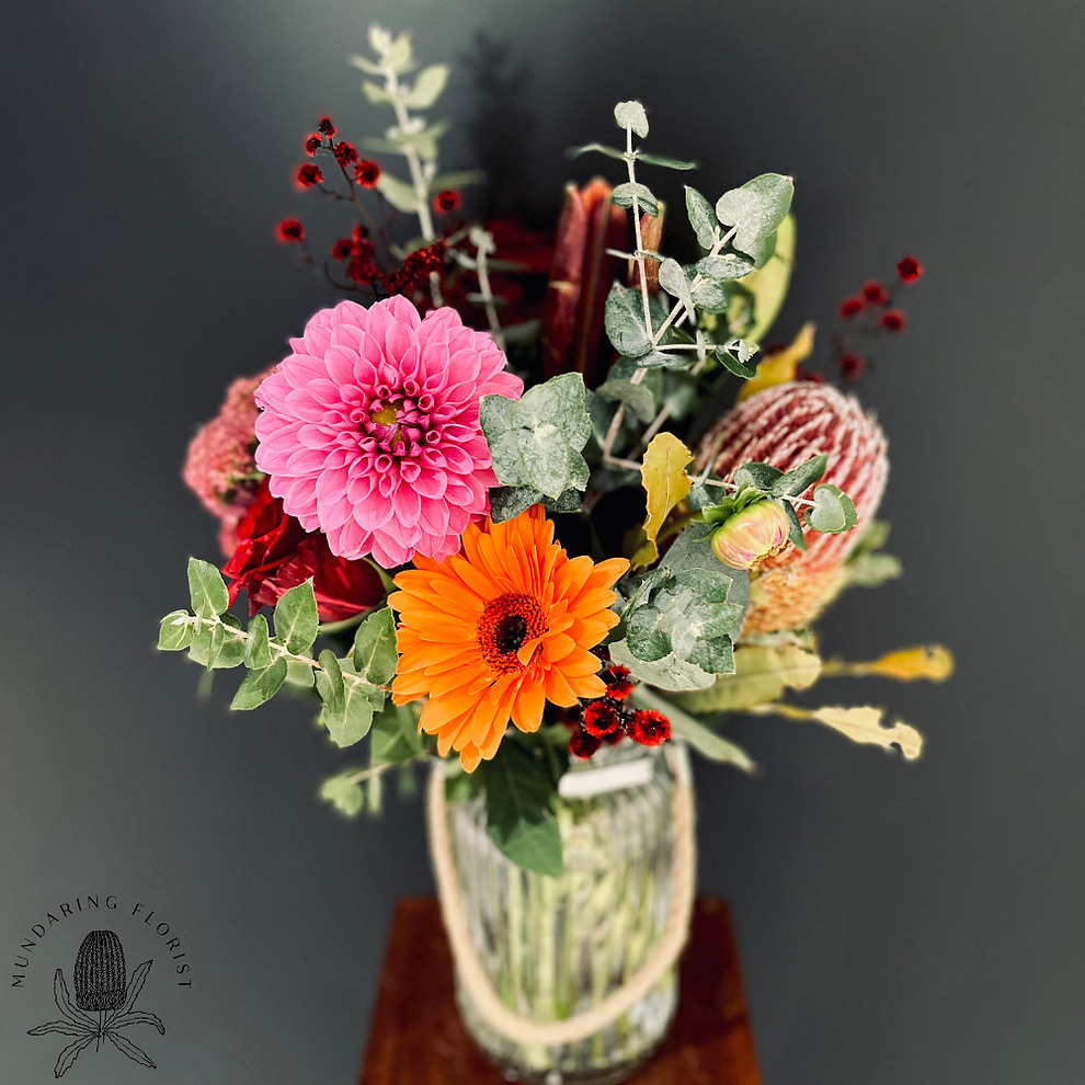 more on Vibrant Seasonal Blooms in Vase