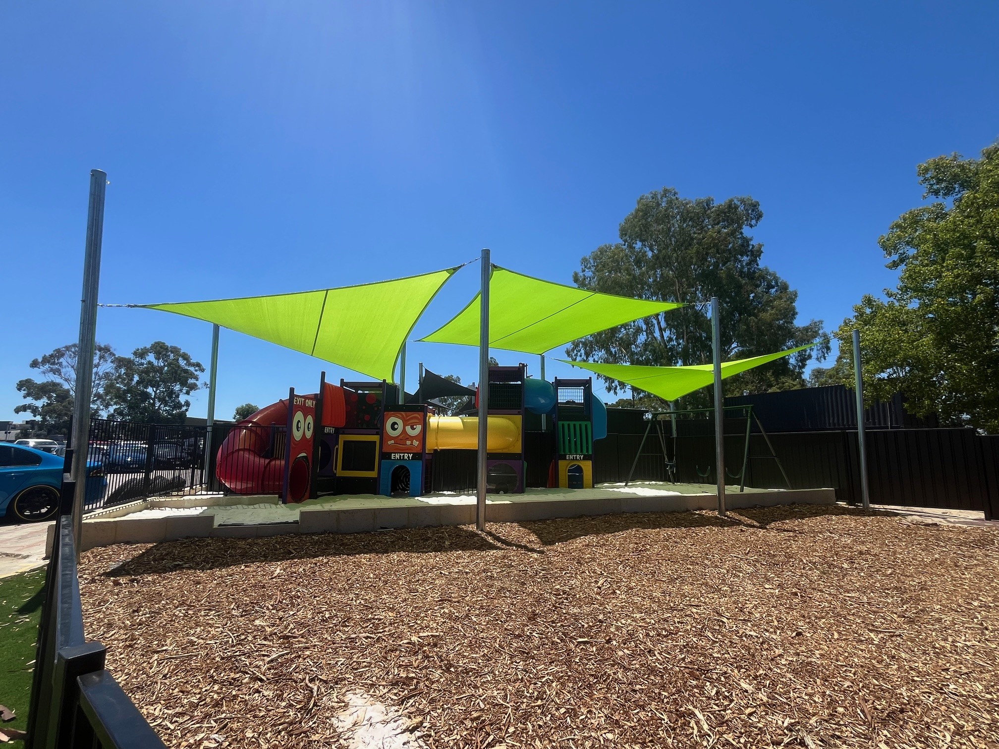 Sail_City_Shade_Sails_with_Motormall_Wangara_Play_ground_sails_Rainbow_Shade_Z16_Zesty_Lime.jpg