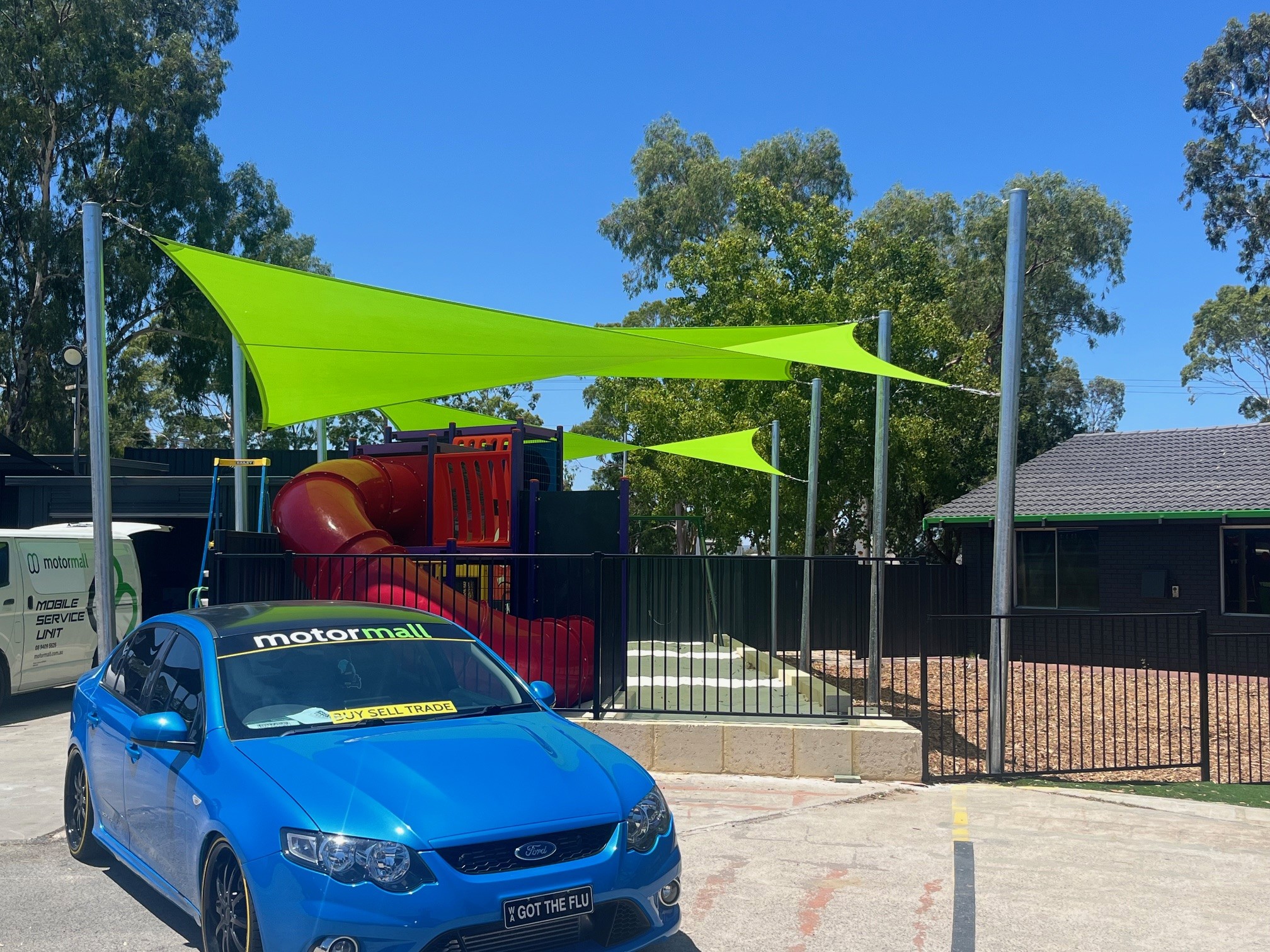 Sail_City_Shade_Sails_with_Motormall_Wangara_Play_ground_sails_Rainbow_Shade_Z16_Zesty_Lime_1.jpg