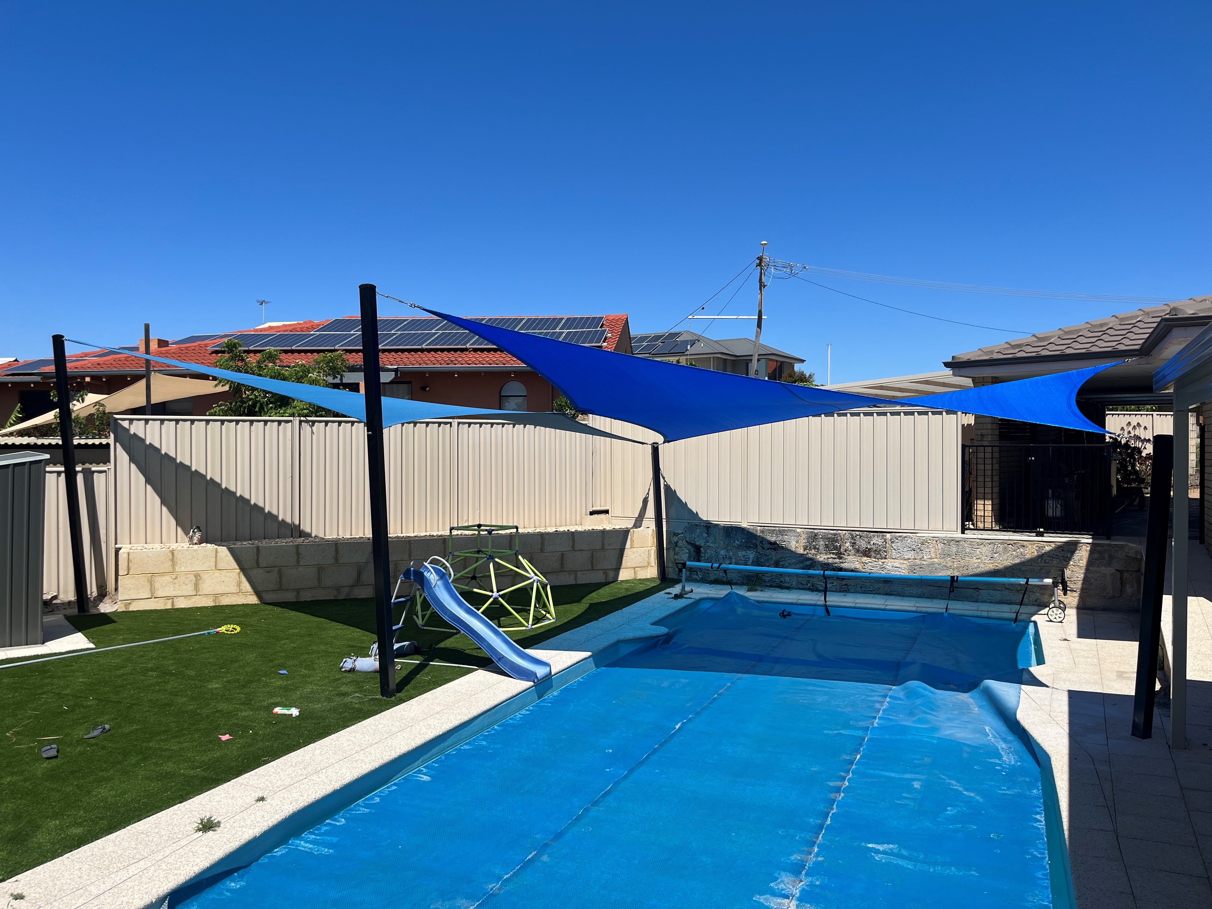 Willetton_Sail_City_Shade_Sails_Z16_Navy_Blue_and_Laguna_Blue_pool_and_play_area_shade.jpg